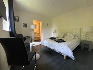 Posteľ alebo postele v izbe v ubytovaní Relais Les Loges-Etretat