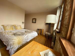 Posteľ alebo postele v izbe v ubytovaní Relais Les Loges-Etretat