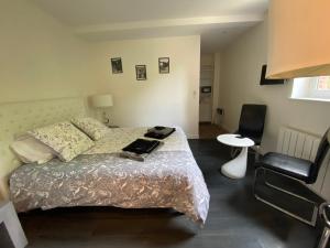 Posteľ alebo postele v izbe v ubytovaní Relais Les Loges-Etretat