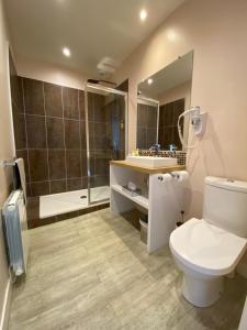 Kúpeľňa v ubytovaní Relais Les Loges-Etretat