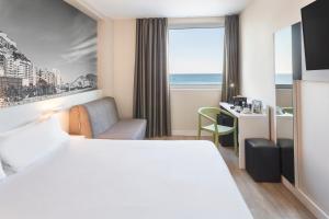 Cama o camas de una habitación en B&B Hotel Alicante