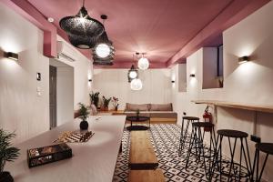 A seating area at When in Athens Hostel