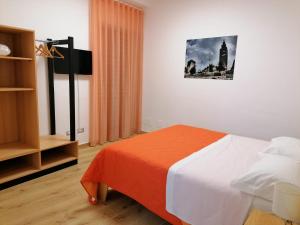 A bed or beds in a room at Nonna Elvira