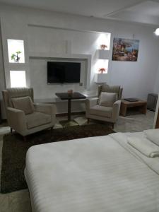Posezení v ubytování ريلاكس إن للشقق الفندقية Relax Inn Hotel Appartment