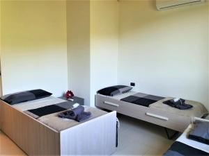 A bed or beds in a room at Villa Joana