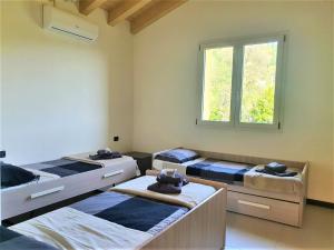 A bed or beds in a room at Villa Joana
