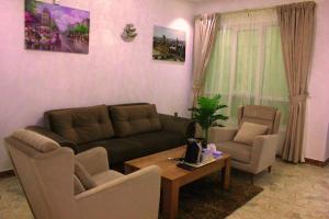 Posezení v ubytování ريلاكس إن للشقق الفندقية Relax Inn Hotel Appartment