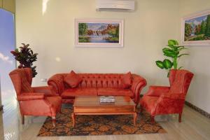 Posezení v ubytování ريلاكس إن للشقق الفندقية Relax Inn Hotel Appartment