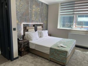 Кровать или кровати в номере Vois Hotel Bostanci & SPA