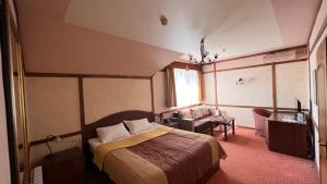 Postel nebo postele na pokoji v ubytování Hotel Complex Bahus