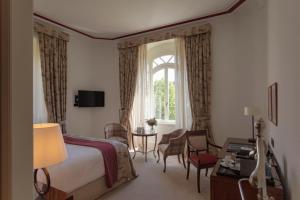 TV a/nebo společenská místnost v ubytování Hotel Villa Soro