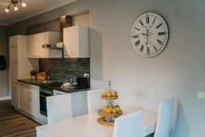 Kuchyň nebo kuchyňský kout v ubytování Velden Appartements am Wörthersee