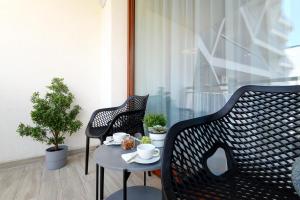 Posedenie v ubytovaní Silver Home Apartments