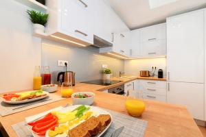 Kuchyňa alebo kuchynka v ubytovaní Silver Home Apartments