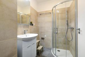 Kúpeľňa v ubytovaní Silver Home Apartments + 12 fotografií