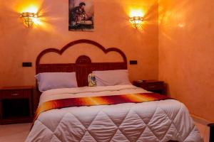 Postel nebo postele na pokoji v ubytování Salma Palms Hôtel