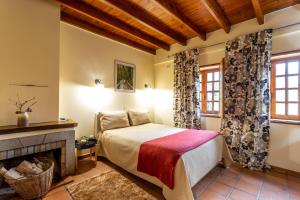 Postel nebo postele na pokoji v ubytování Quinta Do Crestelo Aparthotel + 37 fotografií