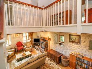 an overhead view of a living room with a stone fireplace at Gag Aye Farm in Buxton