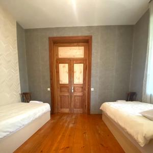 Letto o letti in una camera di Kera