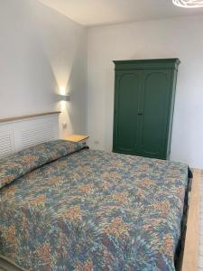 Postel nebo postele na pokoji v ubytování LA CASA DI PIETRA