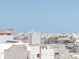 a view of a city with buildings at Superbe Appartement in Sousse