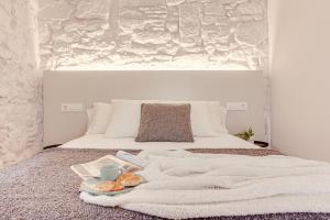 Posteľ alebo postele v izbe v ubytovaní Old Quarter Boutique