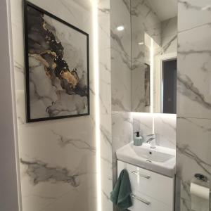 Kúpeľňa v ubytovaní Apartament PERŁA POŁUDNIA
