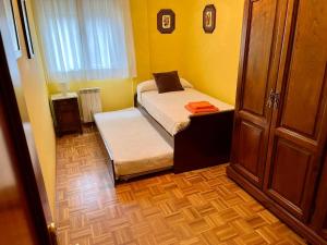 Posteľ alebo postele v izbe v ubytovaní Apartamento en A Pontenova