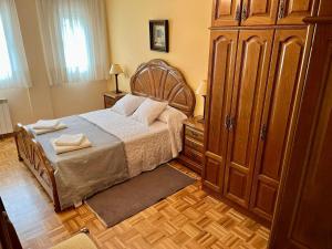 Posteľ alebo postele v izbe v ubytovaní Apartamento en A Pontenova