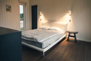 Postel nebo postele na pokoji v ubytování Privaatne rannamaja "Tuultepesa"