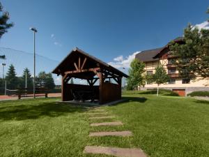 Vonkajšia záhrada v ubytovaní TatryView Apartments by KingDubaj