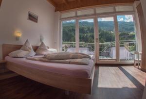 Posteľ alebo postele v izbe v ubytovaní Alpenapart Saphir