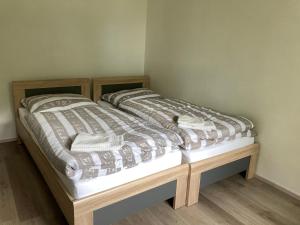 Postel nebo postele na pokoji v ubytování Venkovský dům Dolní Přím + 11 fotografií