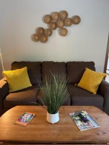 a living room with a couch and a coffee table at Berkshire Valley Inn in North Hancock