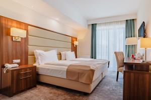 Postel nebo postele na pokoji v ubytování Radsor Hotel + 37 fotografií