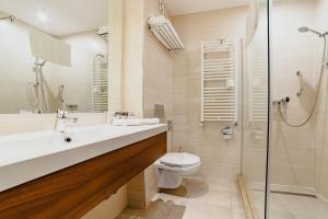 Koupelna v ubytování Radsor Hotel