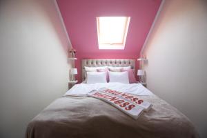 Llit o llits en una habitació de Bükki Villa