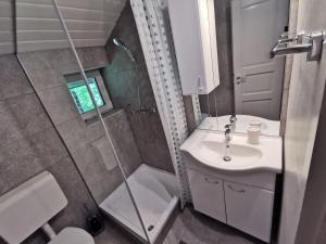 Kylpyhuone majoituspaikassa Apartments Bassanese