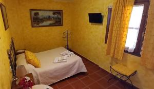 Łóżko lub łóżka w pokoju w obiekcie Casa Rural Aguascebas