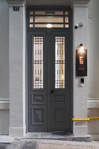 The facade or entrance of When in Athens Hostel