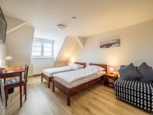 Posteľ alebo postele v izbe v ubytovaní Apartment Jinghu