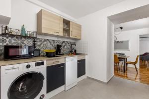 Kuchyňa alebo kuchynka v ubytovaní Apartment Sancti Viti