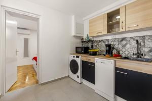 Kuchyňa alebo kuchynka v ubytovaní Apartment Sancti Viti