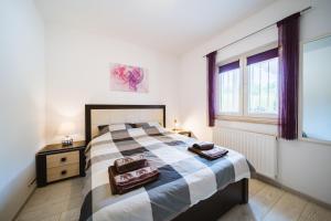 Posteľ alebo postele v izbe v ubytovaní Villa Chiara with Private Pool and garden