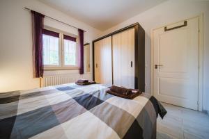 Posteľ alebo postele v izbe v ubytovaní Villa Chiara with Private Pool and garden + 37 fotografií