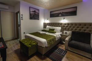 Ένα ή περισσότερα κρεβάτια σε δωμάτιο στο Motel Atos Bungalovi +9 φωτογραφίες