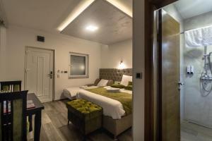 Tempat tidur dalam kamar di Motel Atos Bungalovi