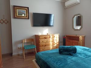 Postel nebo postele na pokoji v ubytování Barzio Paradise