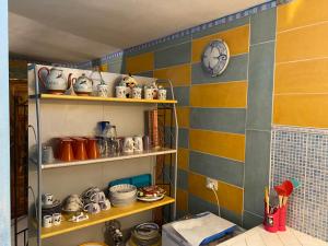 A kitchen or kitchenette at A casa di Oba, a pochi minuti dal mare (IUN P9041)