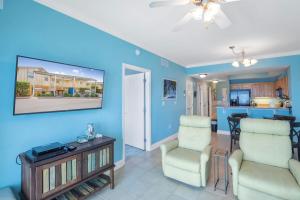 โทรทัศน์และ/หรือระบบความบันเทิงของ Crystal Tower 1906 by Vacation Homes Collection
